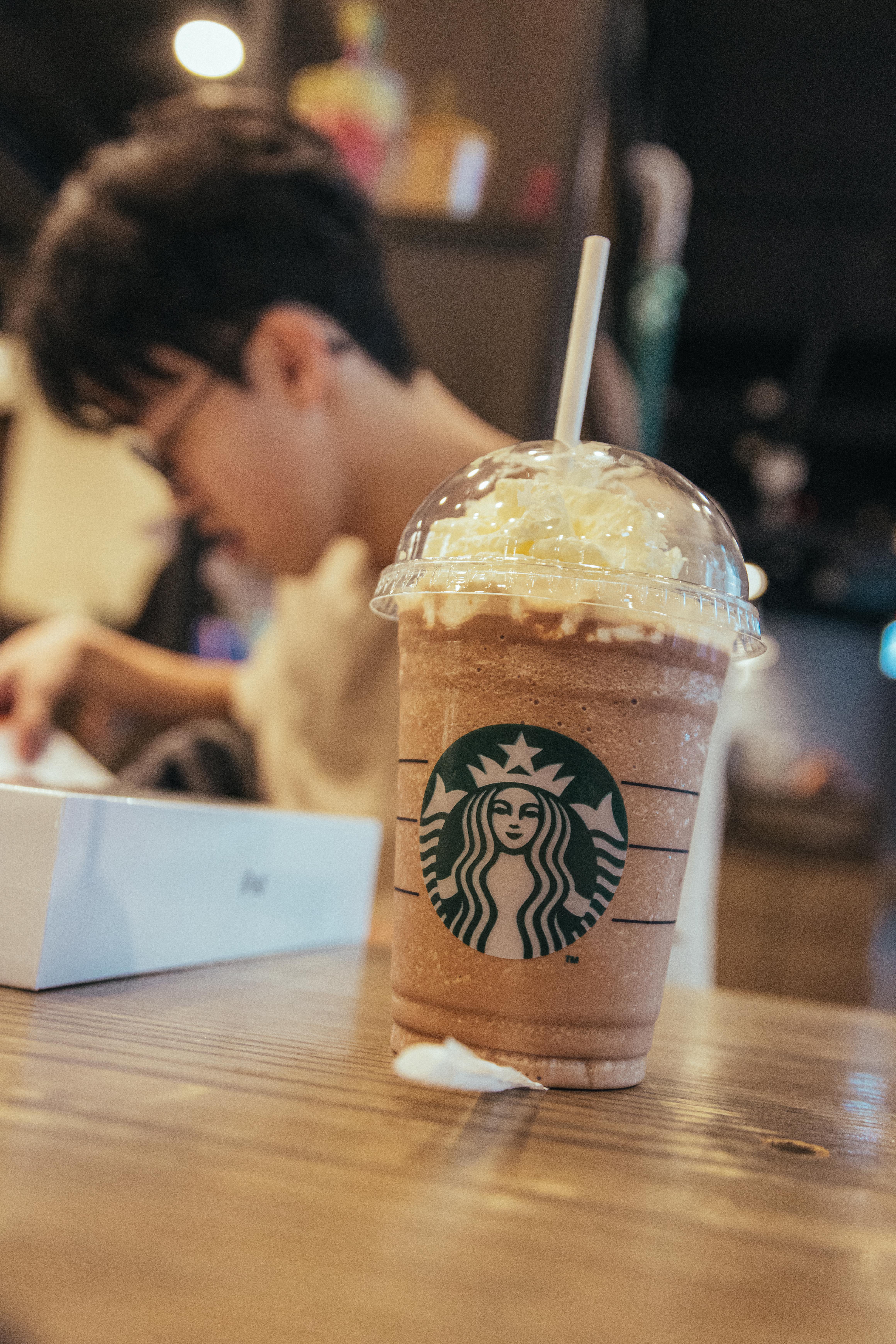 A photograth of a coffee inside Starbucks